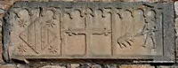 L�PIDA EMPOTRADA EN MURO SUR