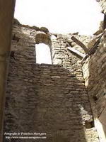 San Saturnino.P&oacute;rtico-campanario.Ventana superiorW